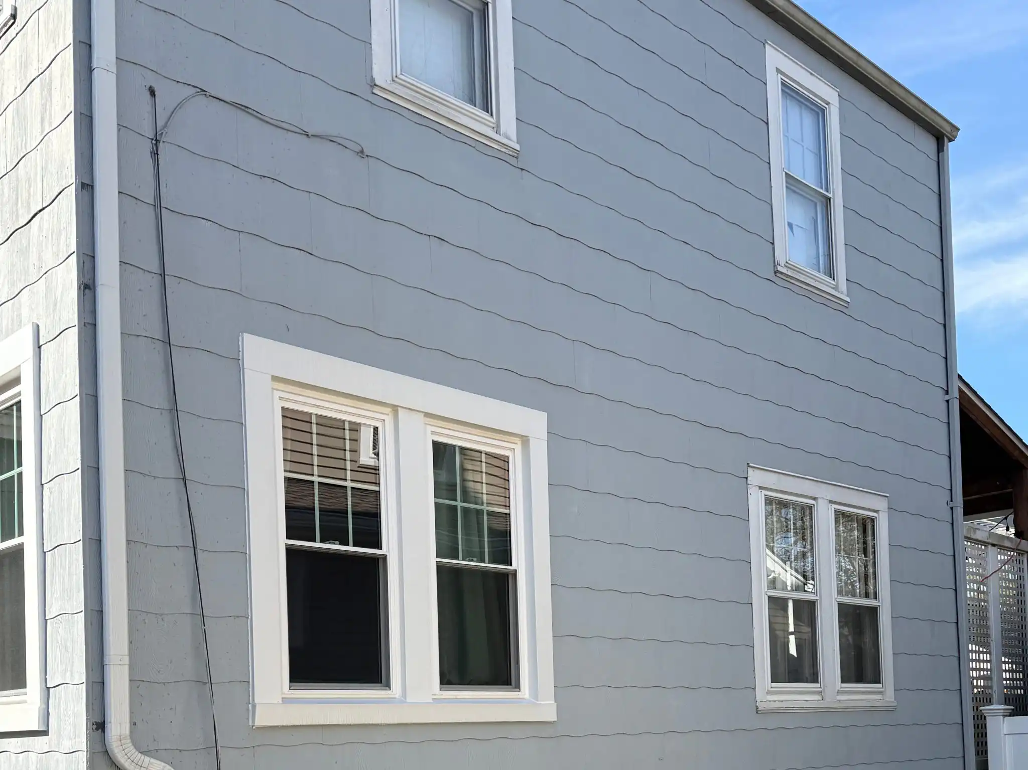 Gray siding and double hung windows on a Villa Park, IL home