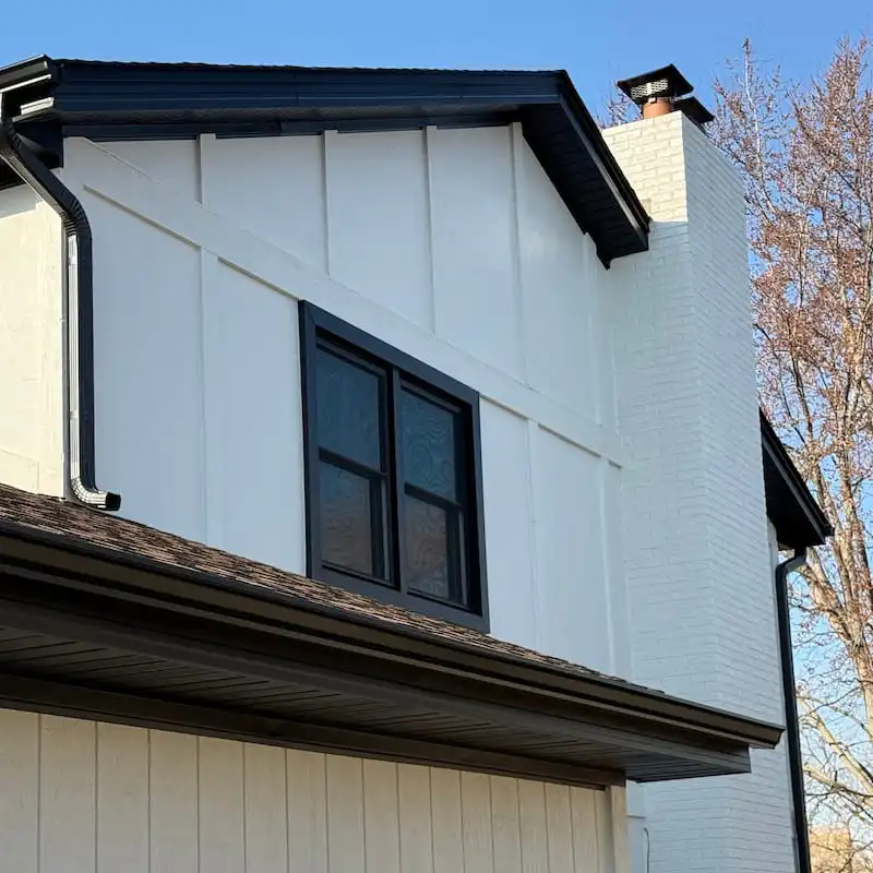Modern house with black window accents in Addison, IL