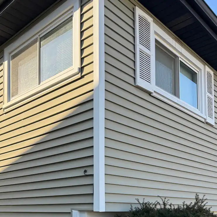 Modern house exterior with windows.