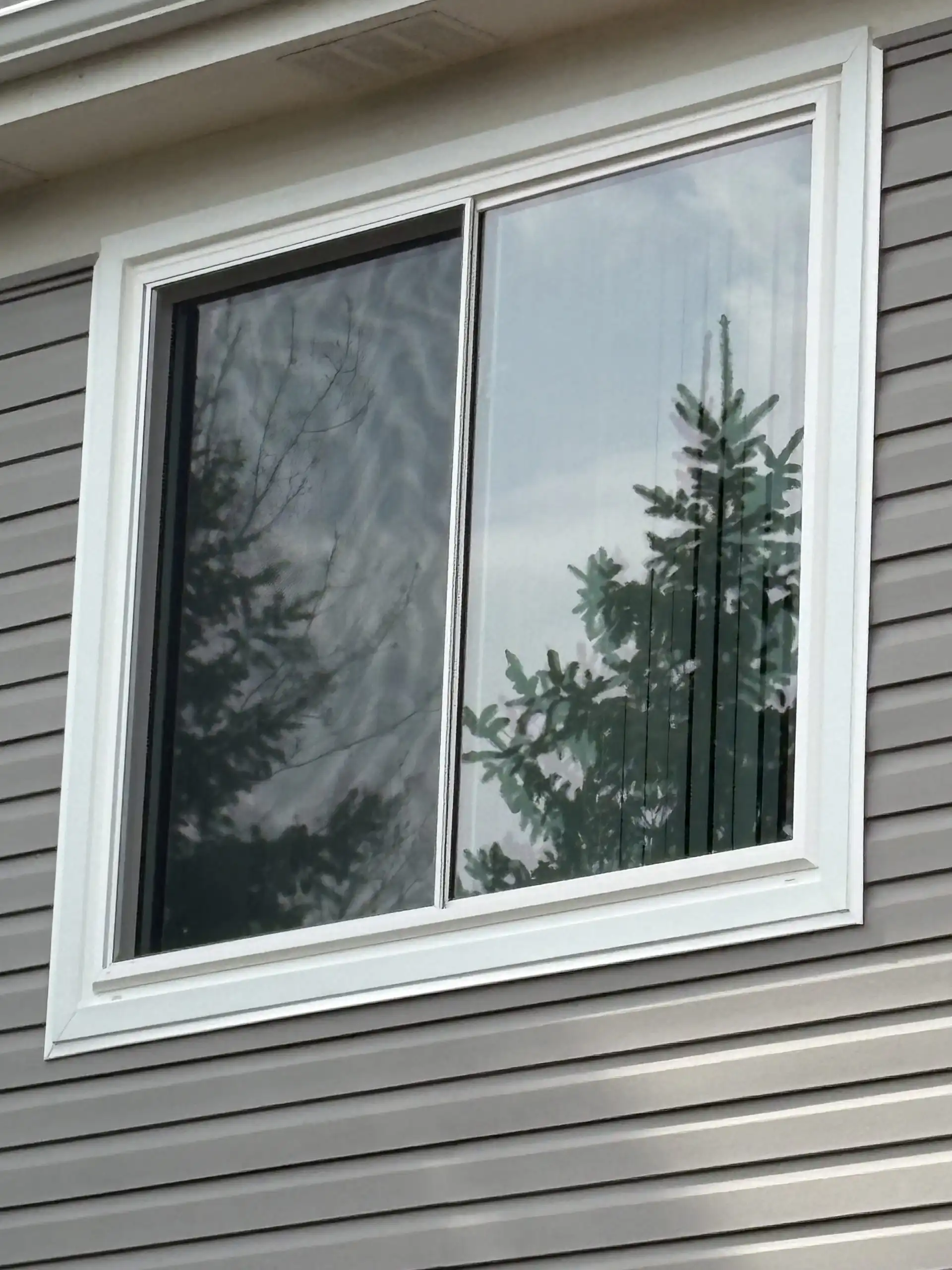 Double hung window on Aurora house.