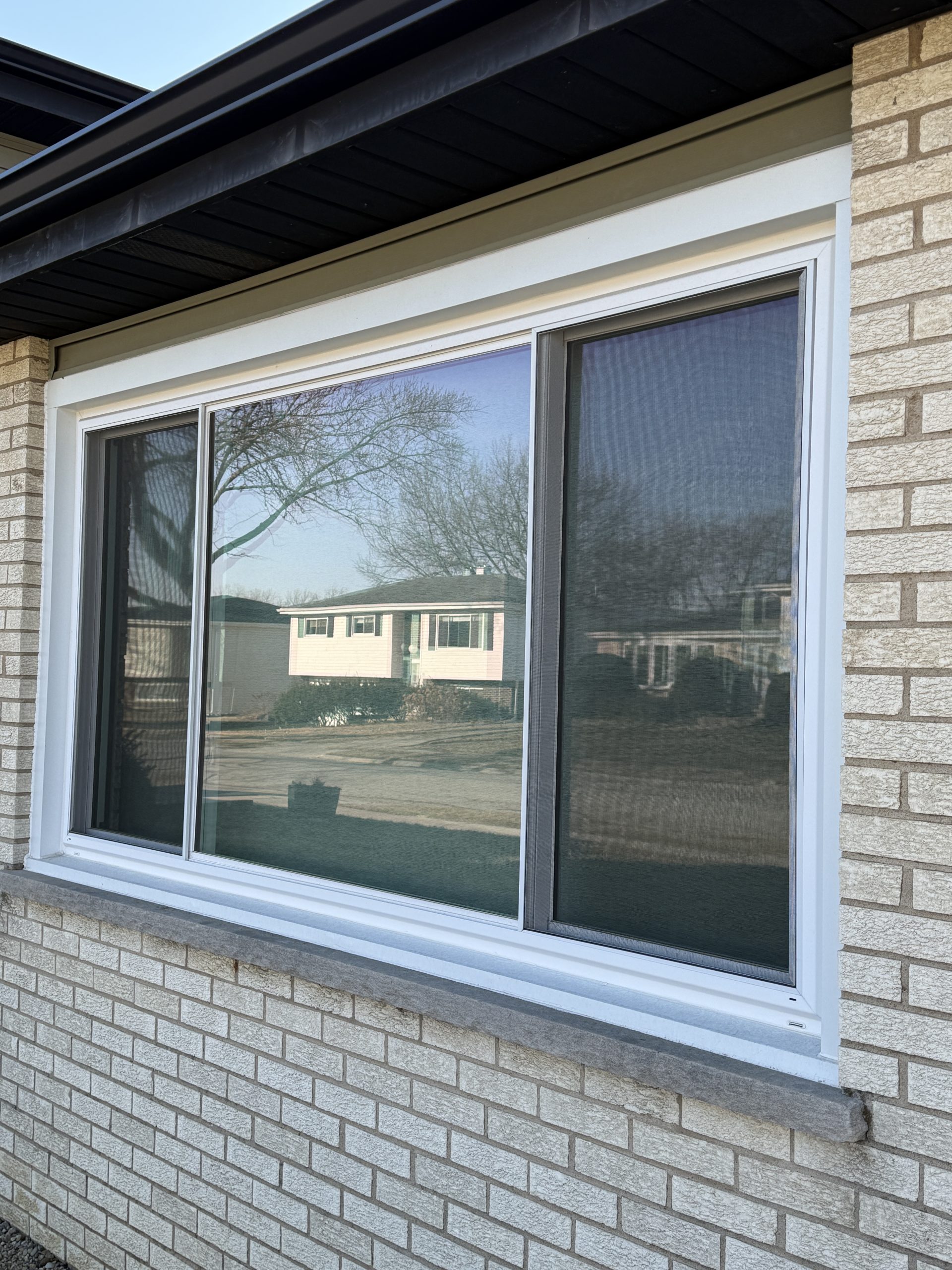 Close up of sliding window on a Addison home that has just been installed.